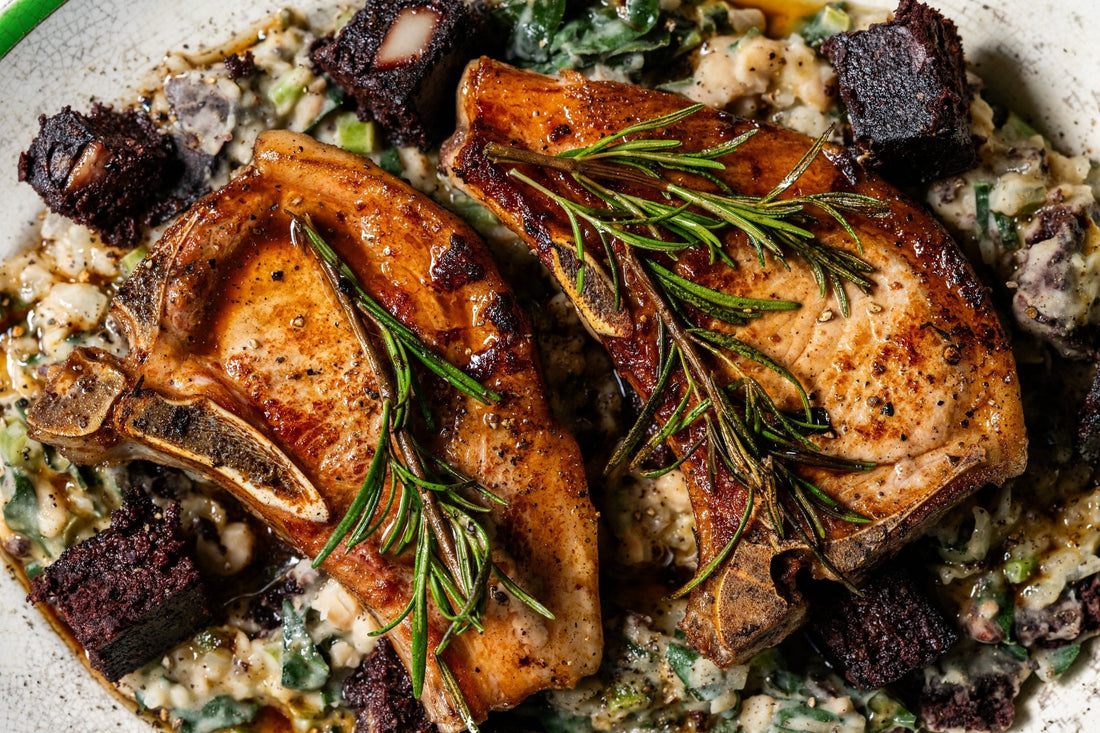 Pork Chops with White Beans, Black Pudding, Kale & Crispy Sage